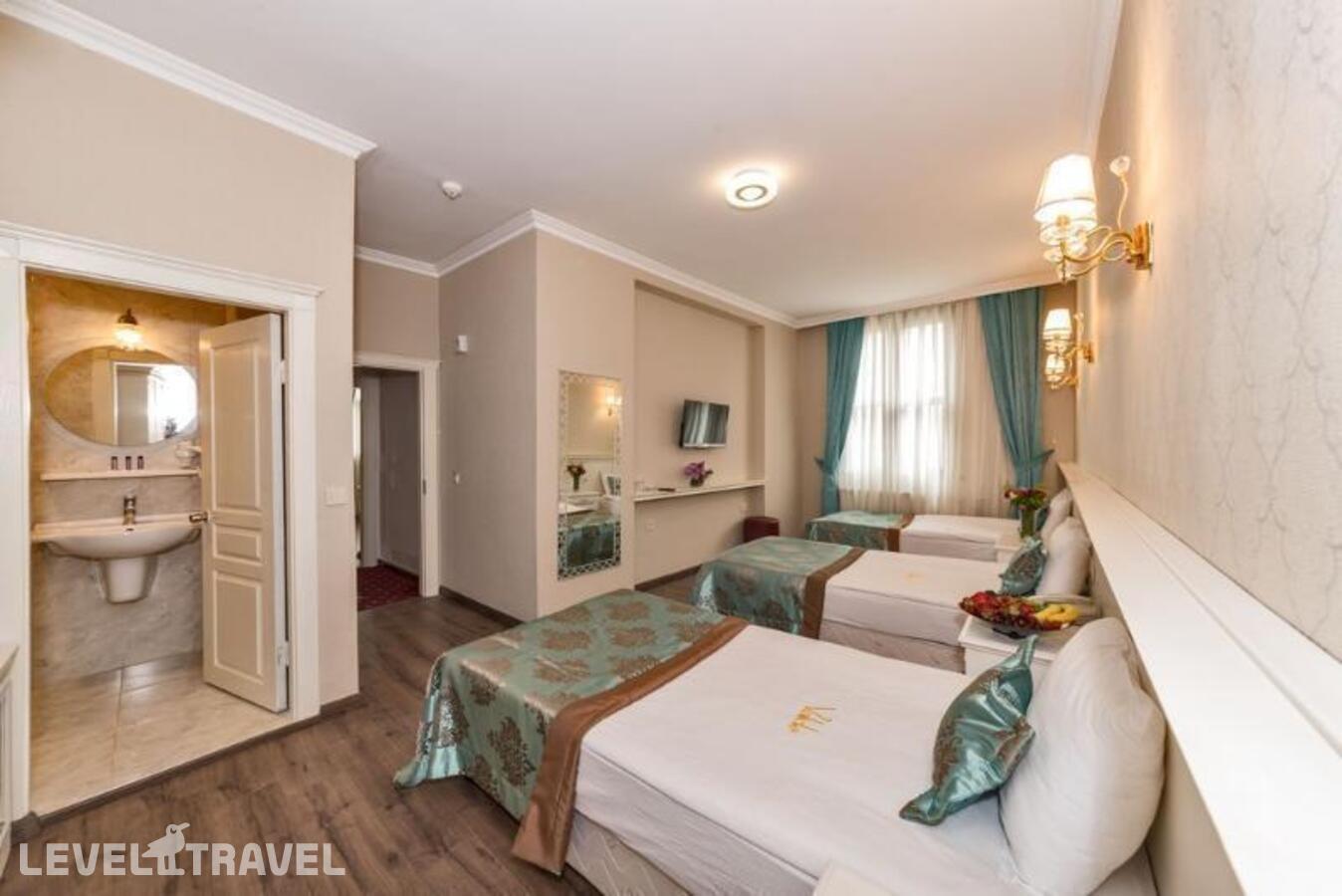фотографии номера Трехместный с видом на город отеля Valide Hotel в Турция(Шишли) - фото №9
