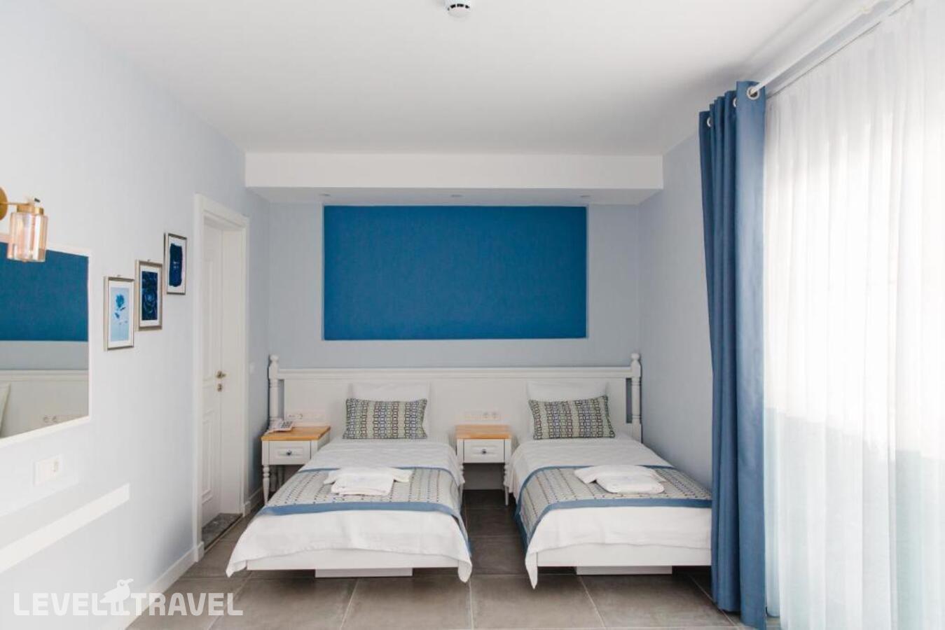 фотографии номера Стандартный (две односпальные кровати) отеля Luvi Kas Otel (Adults Only 16+) в Турция(Каш) - фото №1