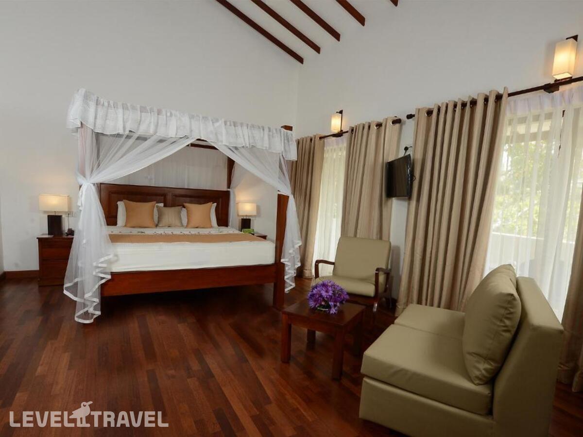 фотографии номера Люкс роскошный с видом на сад отеля Siddhalepa Ayurveda Health Resort в Шри-Ланка(Ваддува) - фото №14