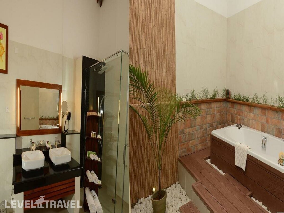 фотографии номера Люкс роскошный с видом на сад отеля Siddhalepa Ayurveda Health Resort в Шри-Ланка(Ваддува) - фото №5