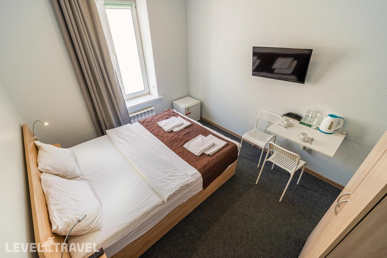 фотографии номера Комфорт (двуспальная кровать) отеля Отель Eagle House Inn в Россия(Владивосток) - фото №2