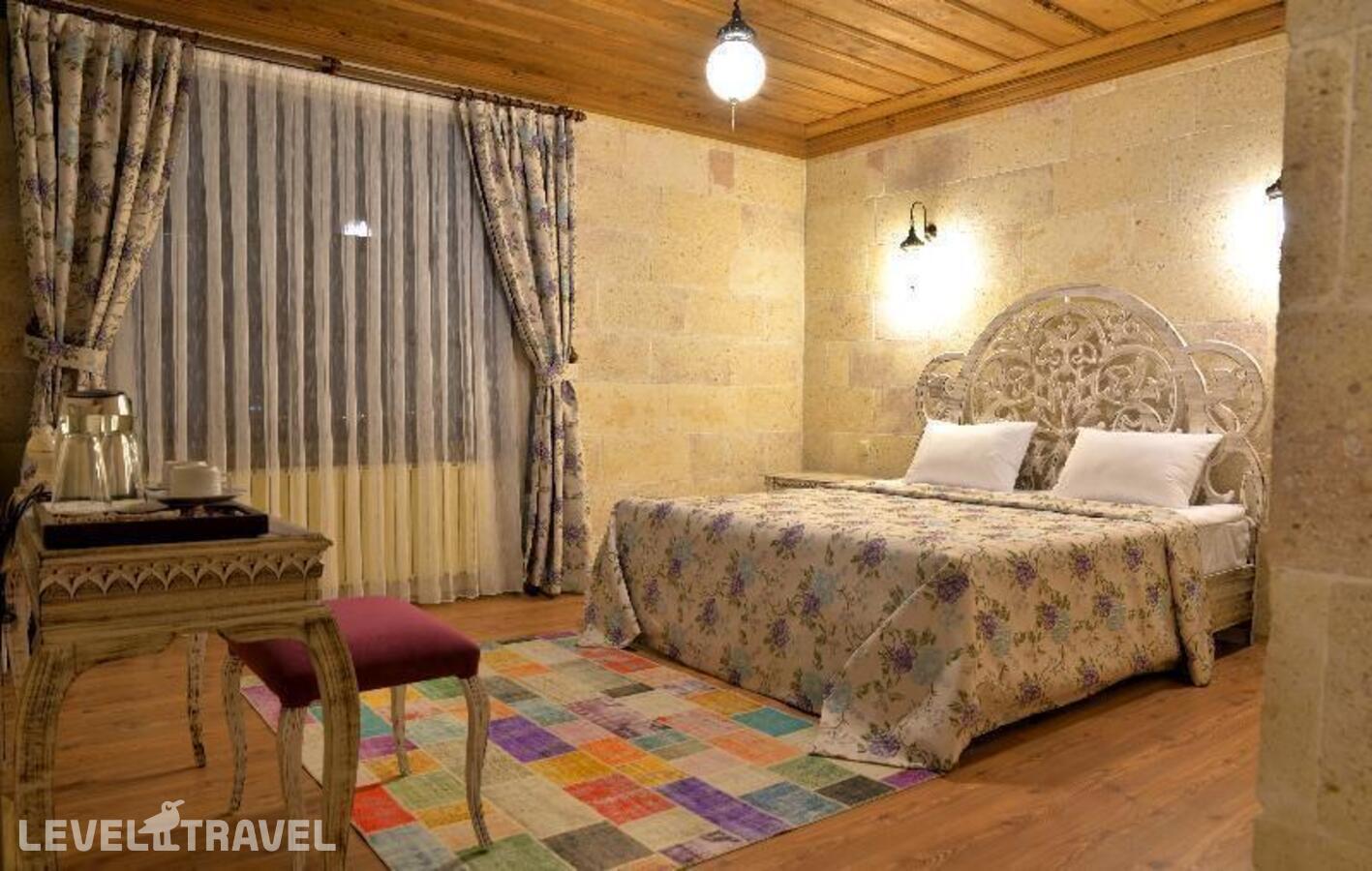фотографии номера Стандартный номер отеля Elevres Stone House в Турция(Ургюп) - фото №3
