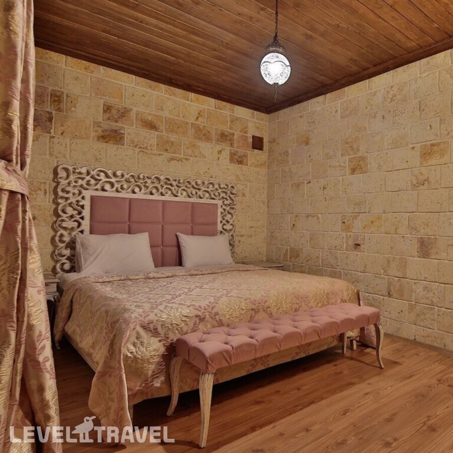 фотографии номера Стандартный номер отеля Elevres Stone House в Турция(Ургюп) - фото №9