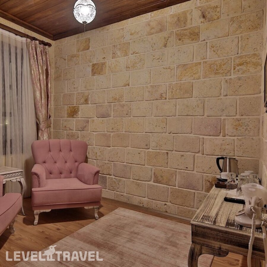 фотографии номера Стандартный номер отеля Elevres Stone House в Турция(Ургюп) - фото №12