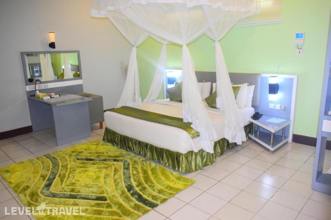 фотографии номера Стандартный с видом на сад отеля Jangwani Sea Breeze Resort в Танзания(Дар-эс-Салам) - фото №8