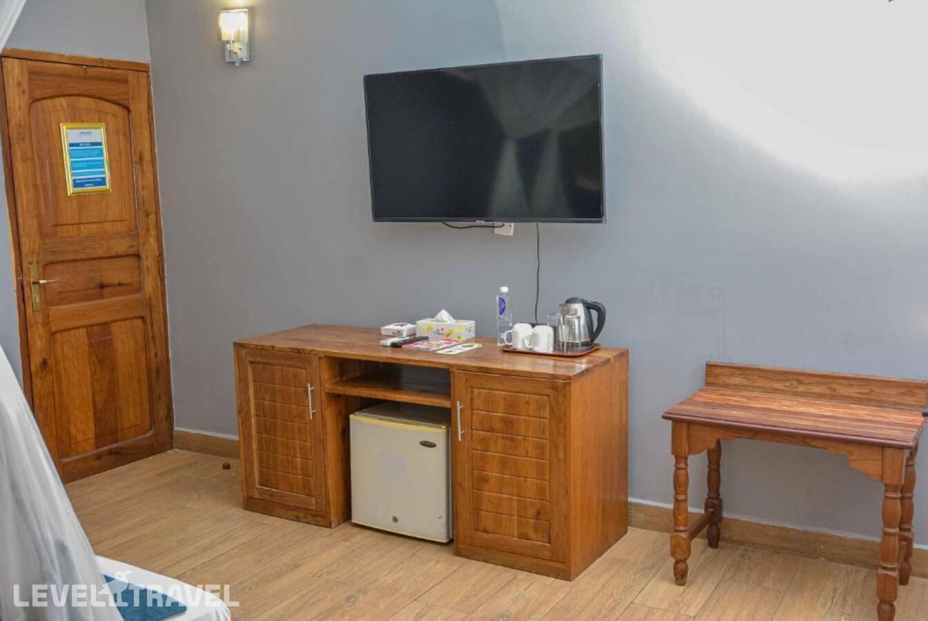 фотографии номера Стандартный с видом на сад отеля Jangwani Sea Breeze Resort в Танзания(Дар-эс-Салам) - фото №6