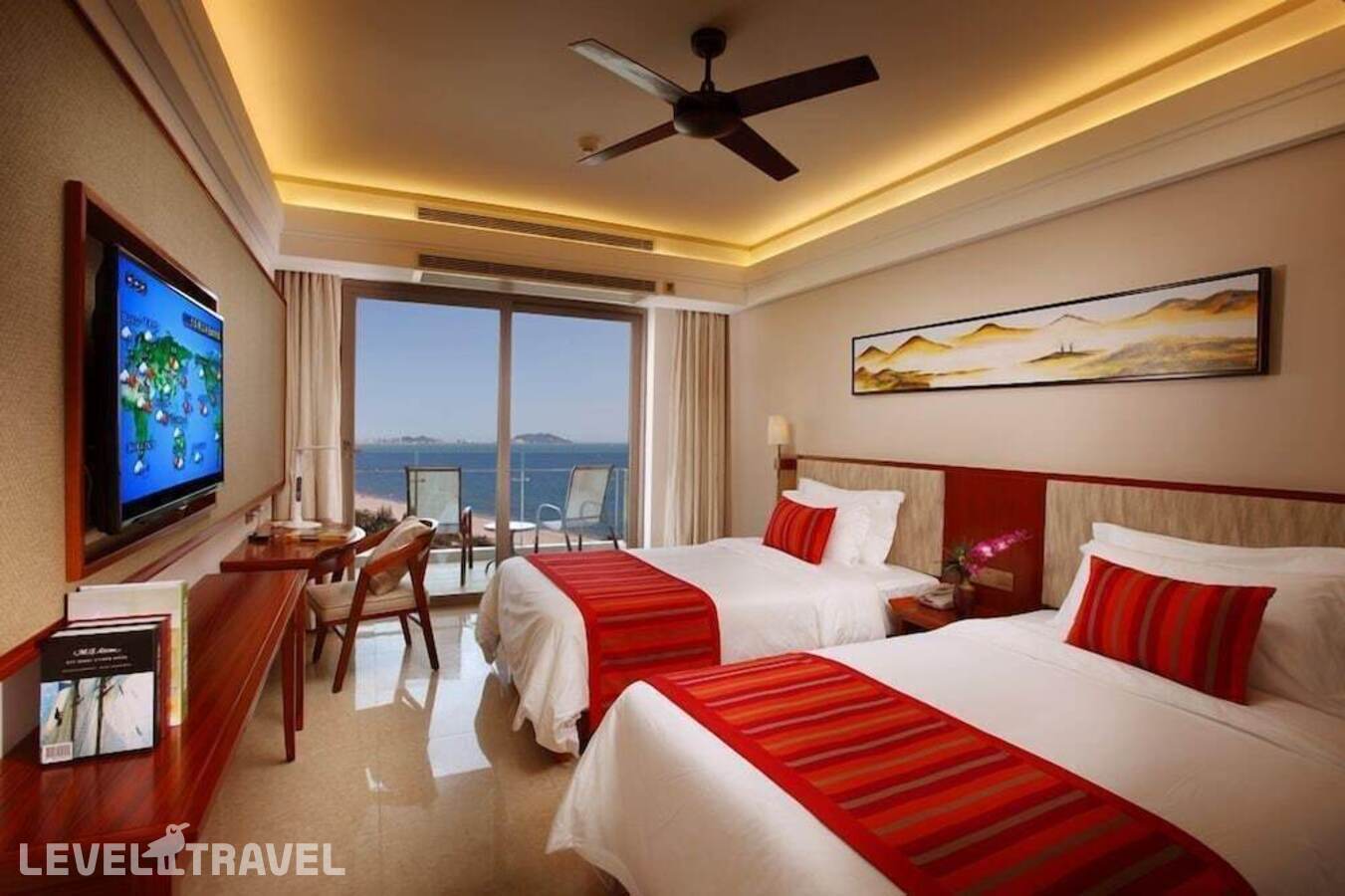 фотографии номера Делюкс (две односпальные кровати) отеля Seacube Resort в Китай(Санья) - фото №1