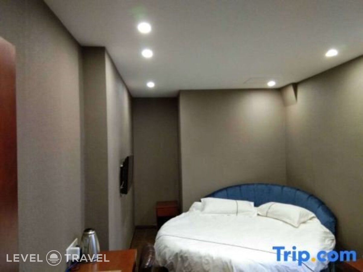 фотографии номера Делюкс с видом на город (две односпальные кровати) отеля Huaxi Hotel в Китай(Харбин) - фото №7