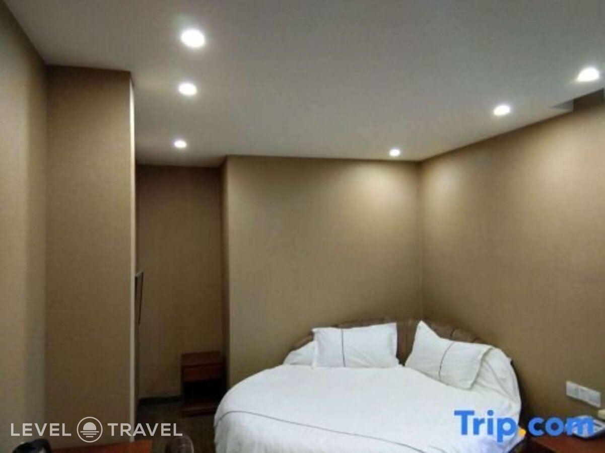 фотографии номера Делюкс с видом на город (две односпальные кровати) отеля Huaxi Hotel в Китай(Харбин) - фото №6