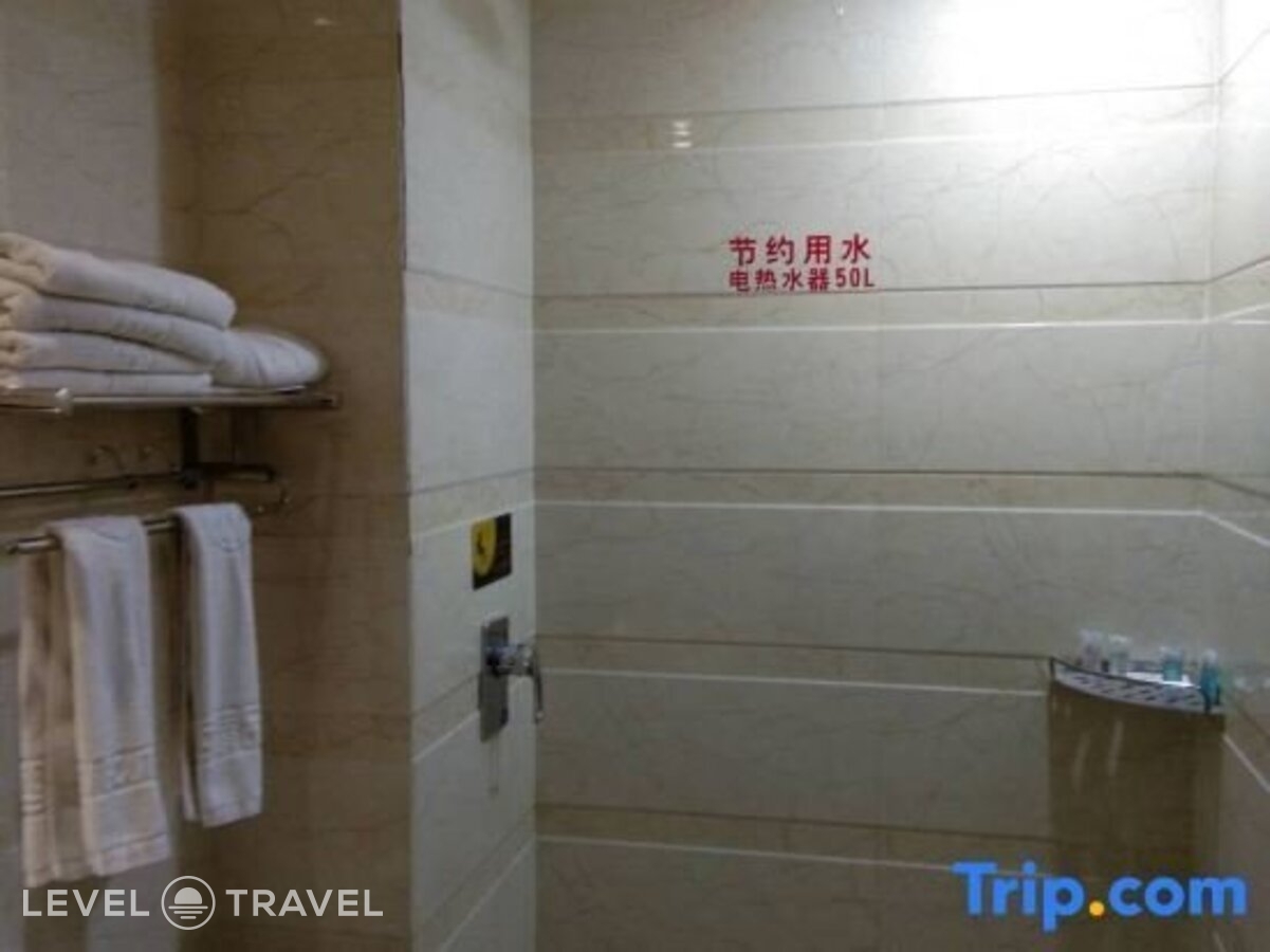фотографии номера Делюкс с видом на город (две односпальные кровати) отеля Huaxi Hotel в Китай(Харбин) - фото №9
