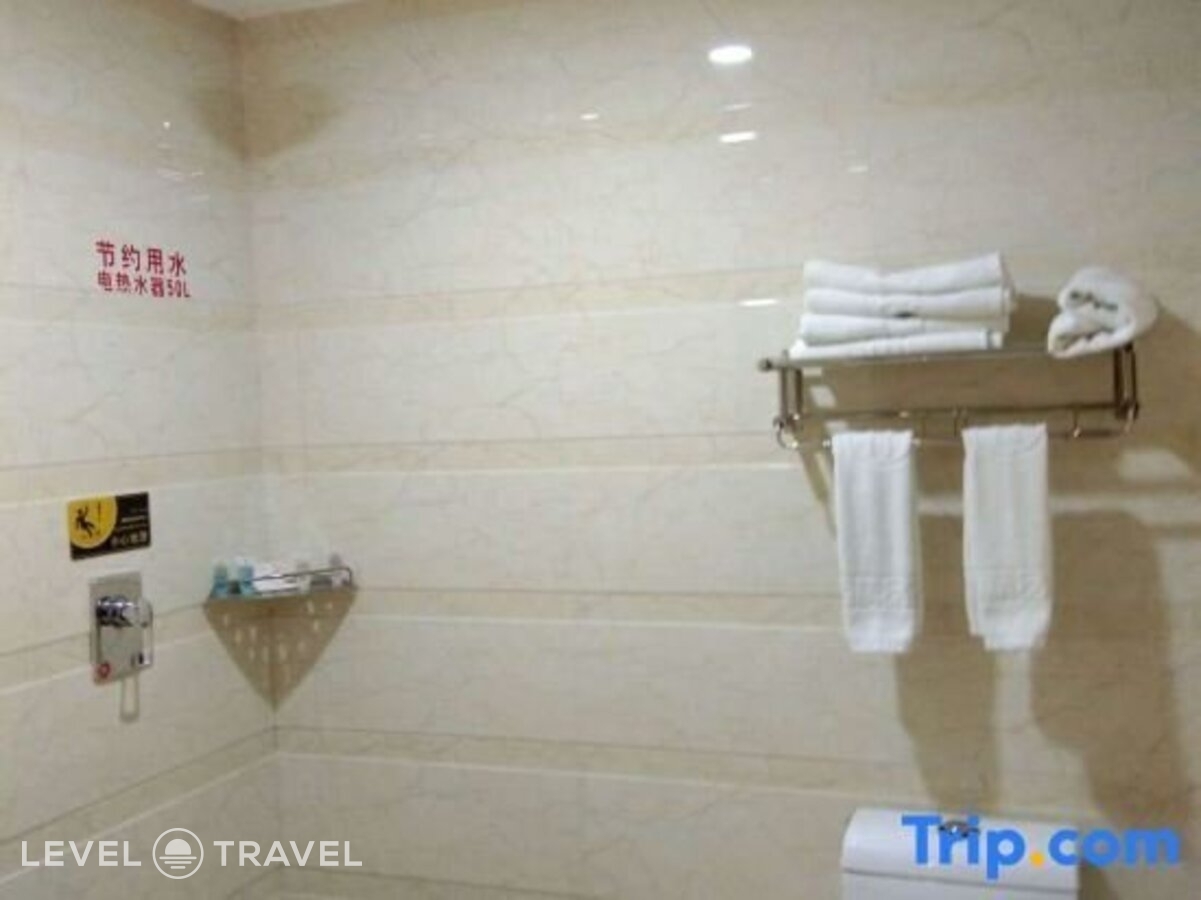фотографии номера Делюкс с видом на город (две односпальные кровати) отеля Huaxi Hotel в Китай(Харбин) - фото №11