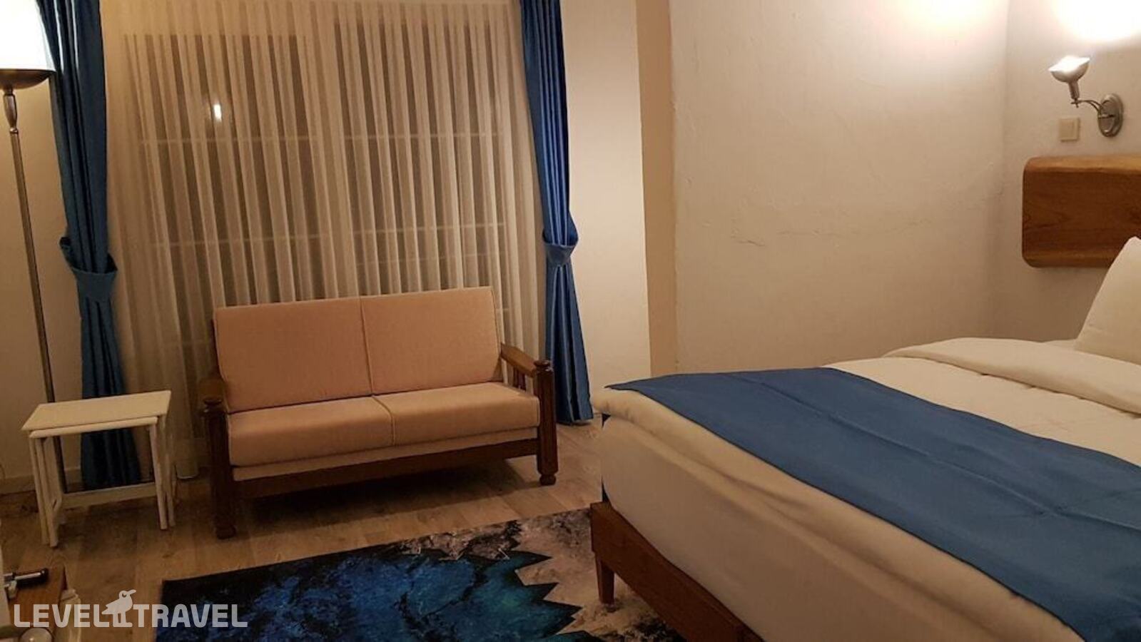 фотографии номера Четырехместный улучшенный отеля Alaçatı Otel Rebetiko в Турция(Чешме) - фото №1