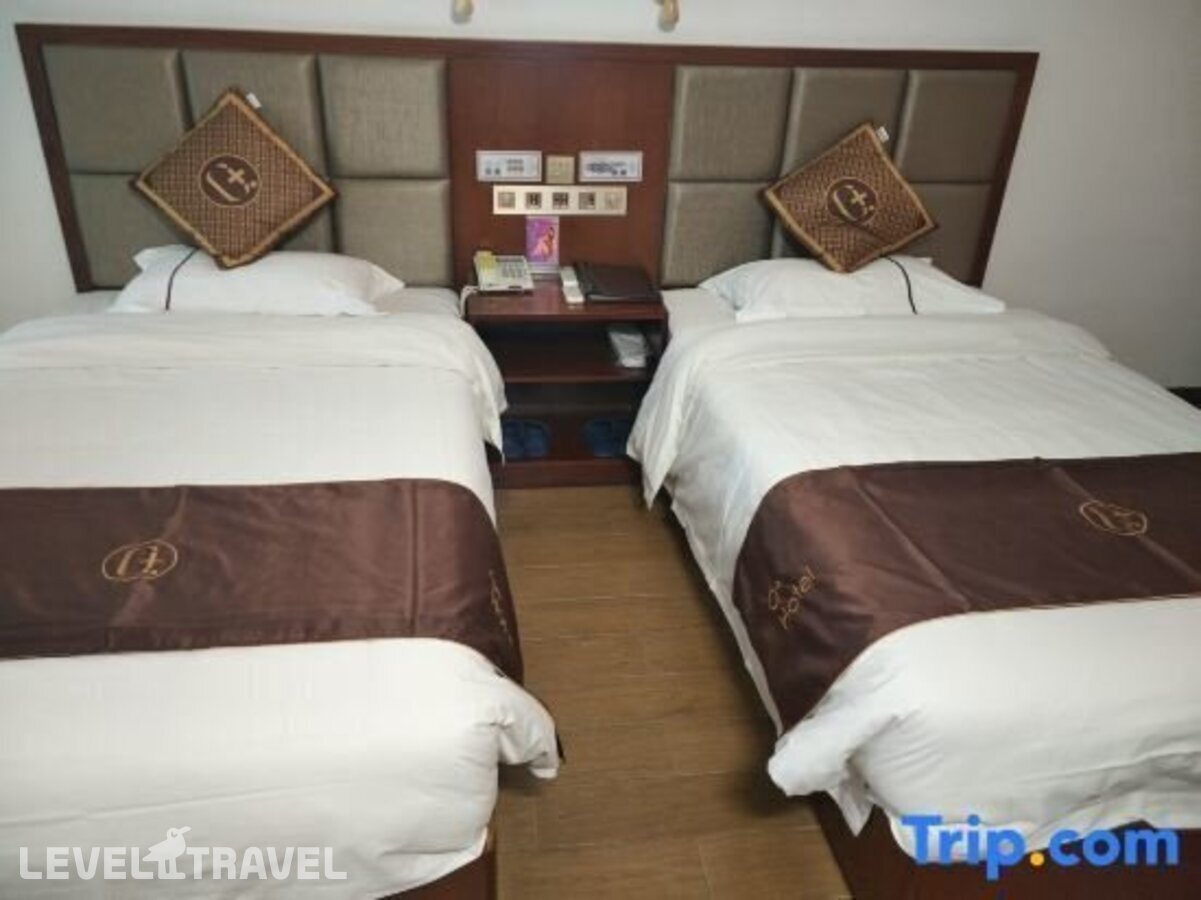 фотографии номера Стандартный номер отеля Q+ Xiangrui Seaview Business Hotel в Китай(Ледонг ) - фото №4