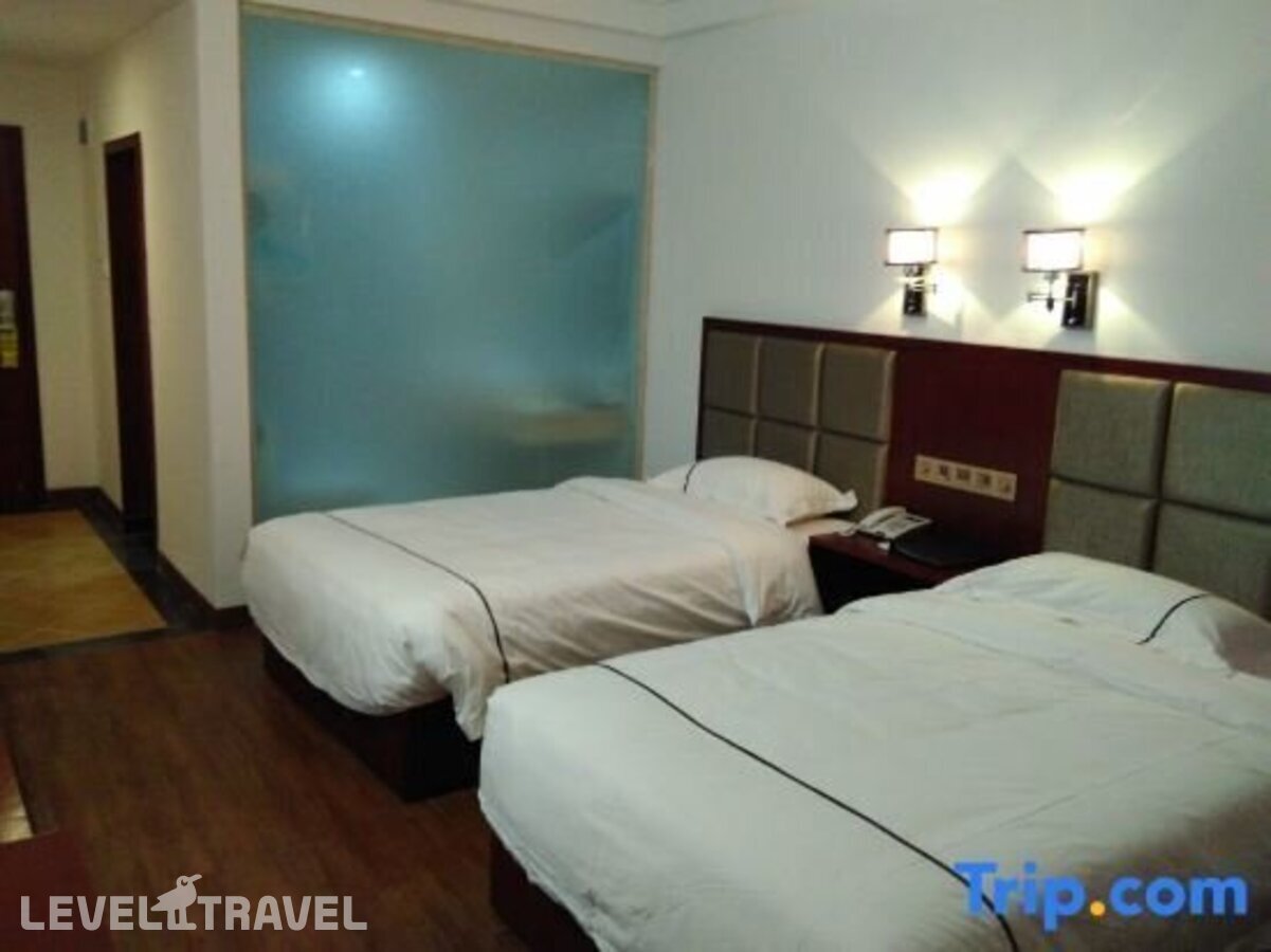 фотографии номера Стандартный номер отеля Q+ Xiangrui Seaview Business Hotel в Китай(Ледонг ) - фото №8