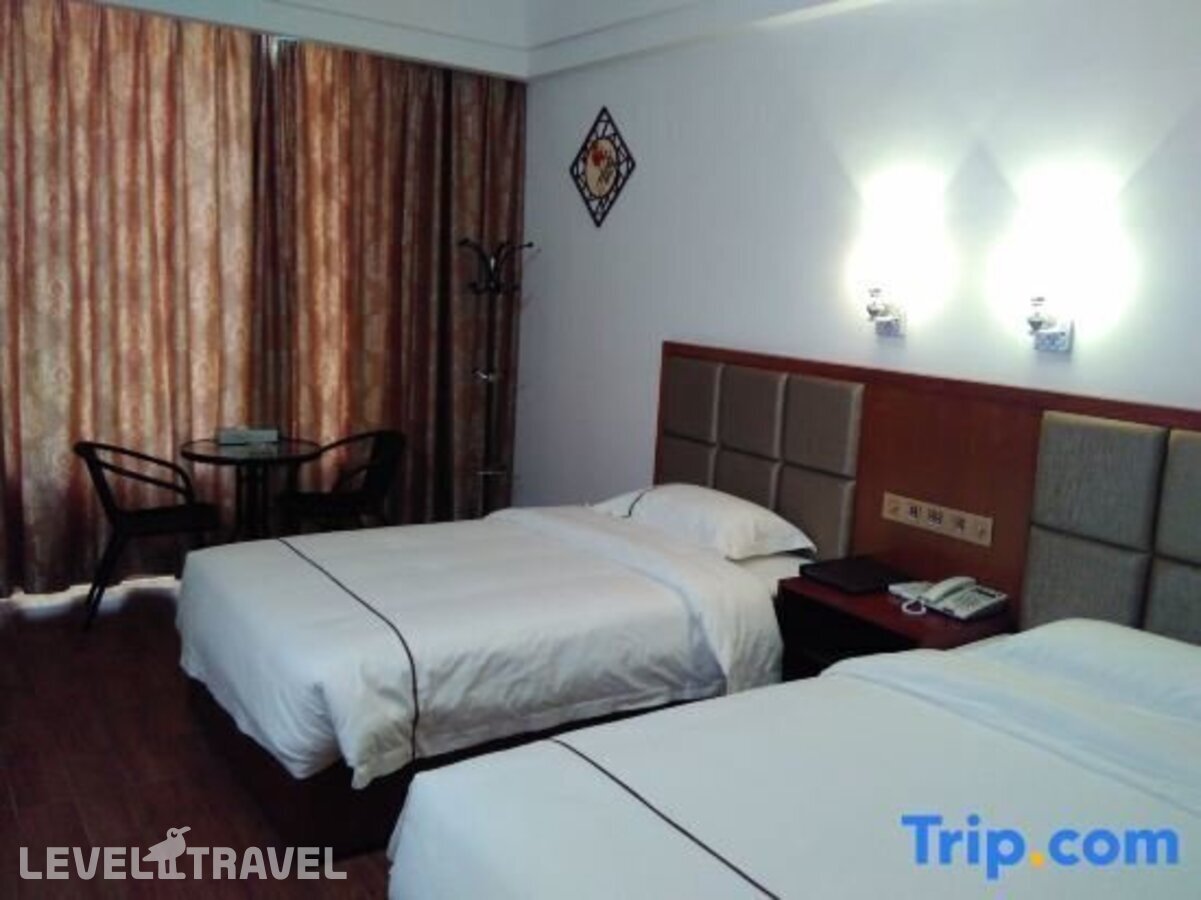 фотографии номера Стандартный номер отеля Q+ Xiangrui Seaview Business Hotel в Китай(Ледонг ) - фото №3