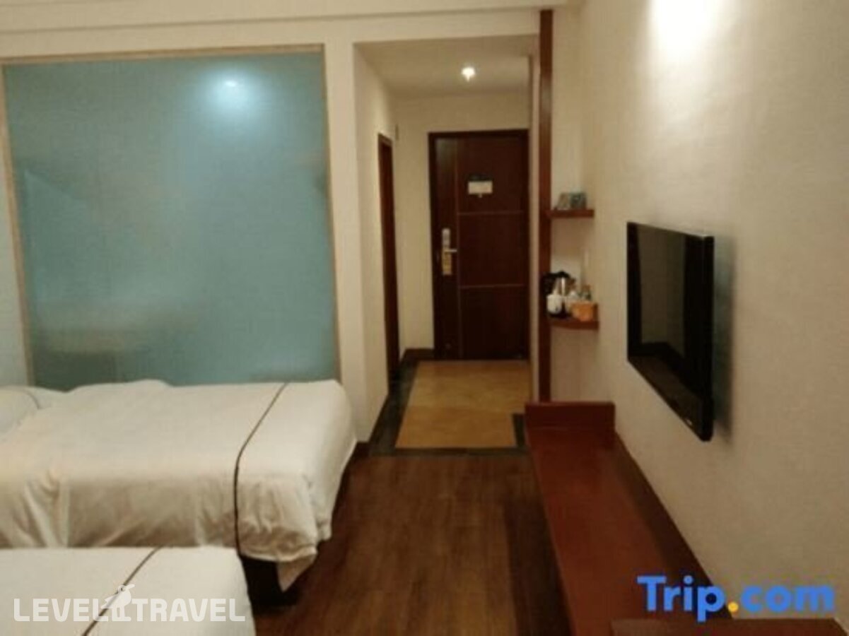 фотографии номера Стандартный номер отеля Q+ Xiangrui Seaview Business Hotel в Китай(Ледонг ) - фото №2
