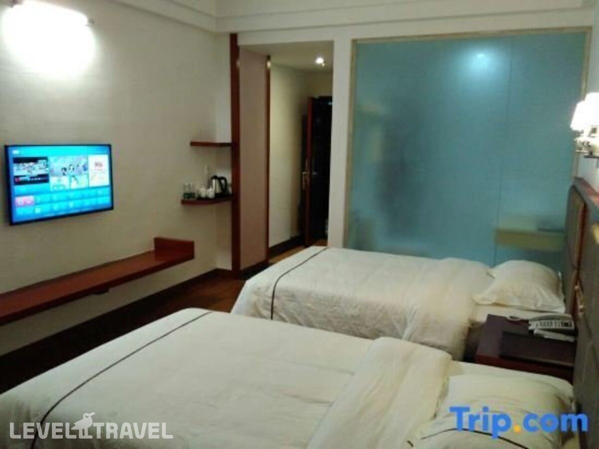 фотографии номера Стандартный номер отеля Q+ Xiangrui Seaview Business Hotel в Китай(Ледонг ) - фото №7