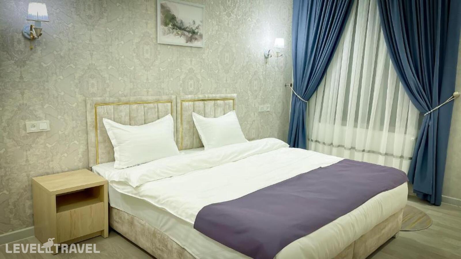 фотографии номера Трехместный номер отеля Marmaris Hotel в Узбекистан(Ташкент) - фото №1