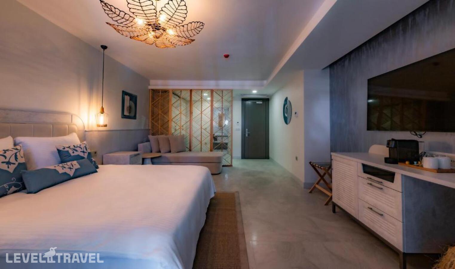 фотографии номера Делюкс с видом на сад отеля Suum Bodrum (Ex. Camelot Boutique & Beach) в Турция(Акьярлар) - фото №3