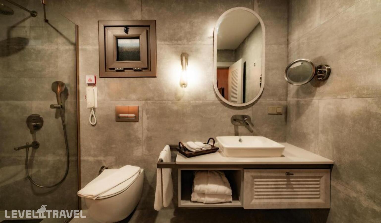 фотографии номера Делюкс с видом на сад отеля Suum Bodrum (Ex. Camelot Boutique & Beach) в Турция(Акьярлар) - фото №6