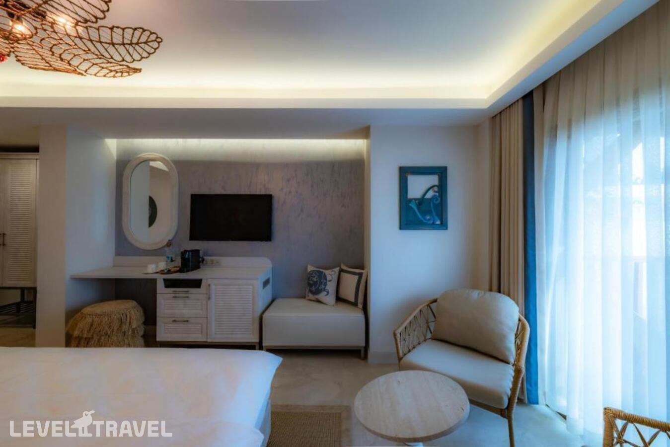 фотографии номера Делюкс с видом на сад отеля Suum Bodrum (Ex. Camelot Boutique & Beach) в Турция(Акьярлар) - фото №4