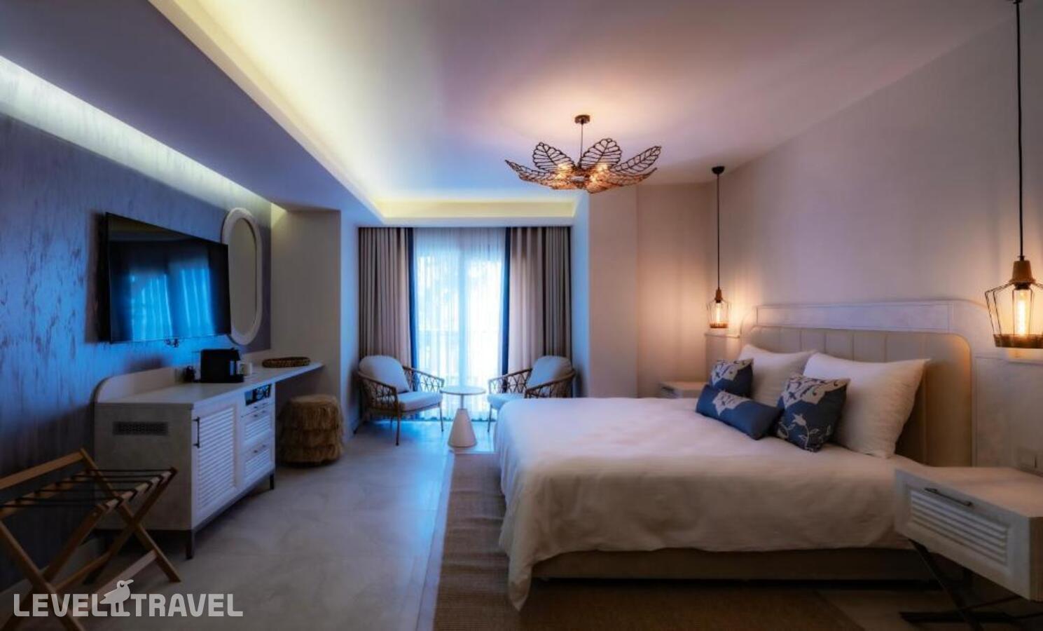 фотографии номера Делюкс с видом на сад отеля Suum Bodrum (Ex. Camelot Boutique & Beach) в Турция(Акьярлар) - фото №2