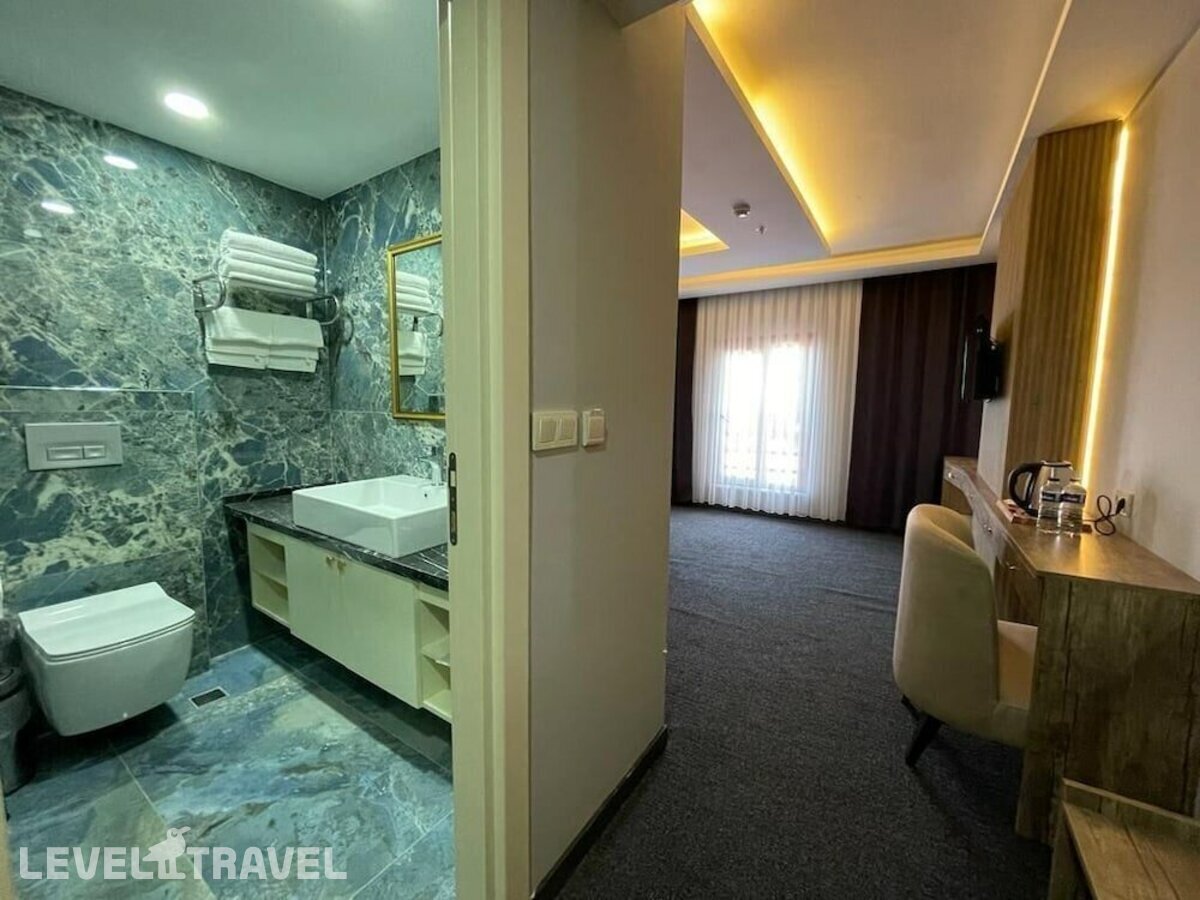 фотографии номера Роскошный люкс отеля Sevcan Hotel в Турция(Бакыркёй) - фото №6