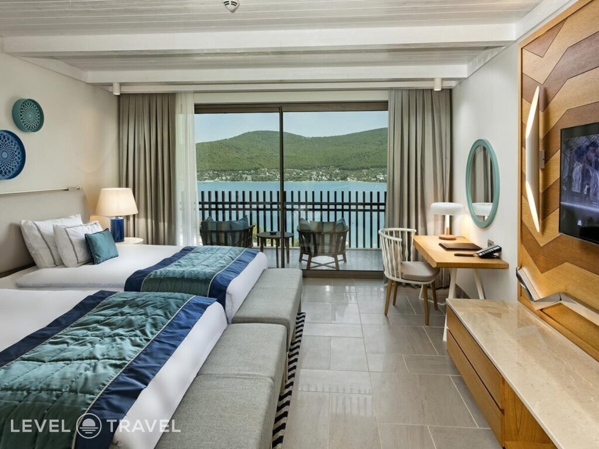 фотографии номера Стандартный (две односпальные кровати) отеля Titanic Luxury Collection Bodrum (Ex. Titanic Deluxe Bodrum) в Турция(Гюверджинлик) - фото №1