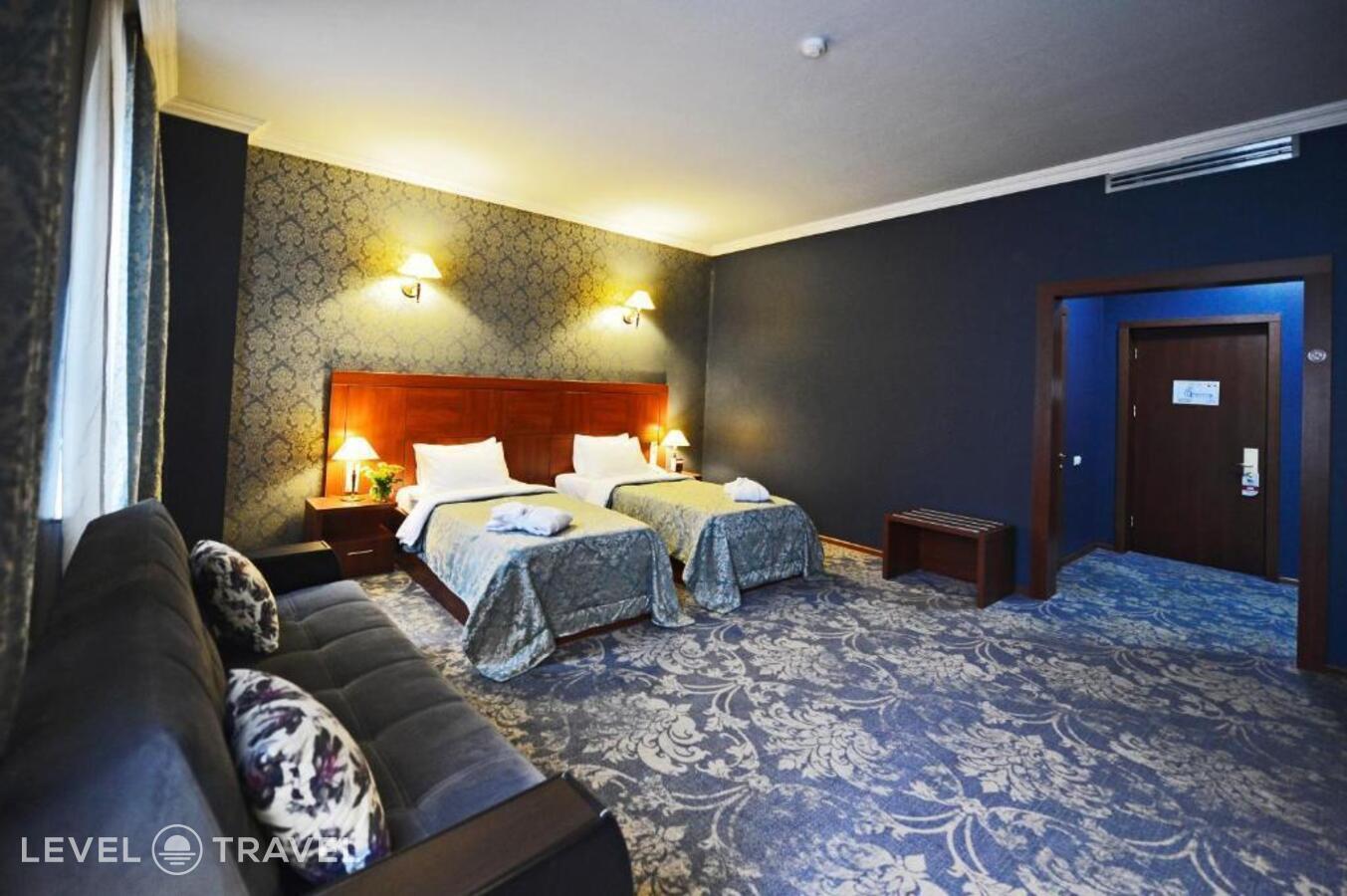 фотографии номера Делюкс (две односпальные кровати) отеля Astoria Hotel Tbilisi в Грузия(Тбилиси) - фото №2