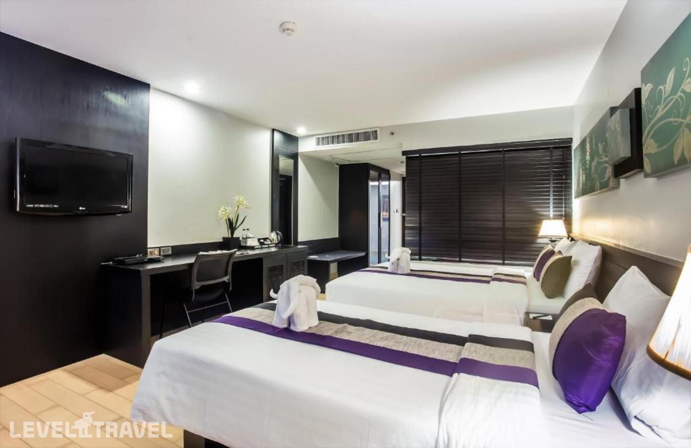 фотографии номера Гранд делюкс (две односпальные кровати) отеля Nouvo City Hotel в Таиланд(Бангкок) - фото №3