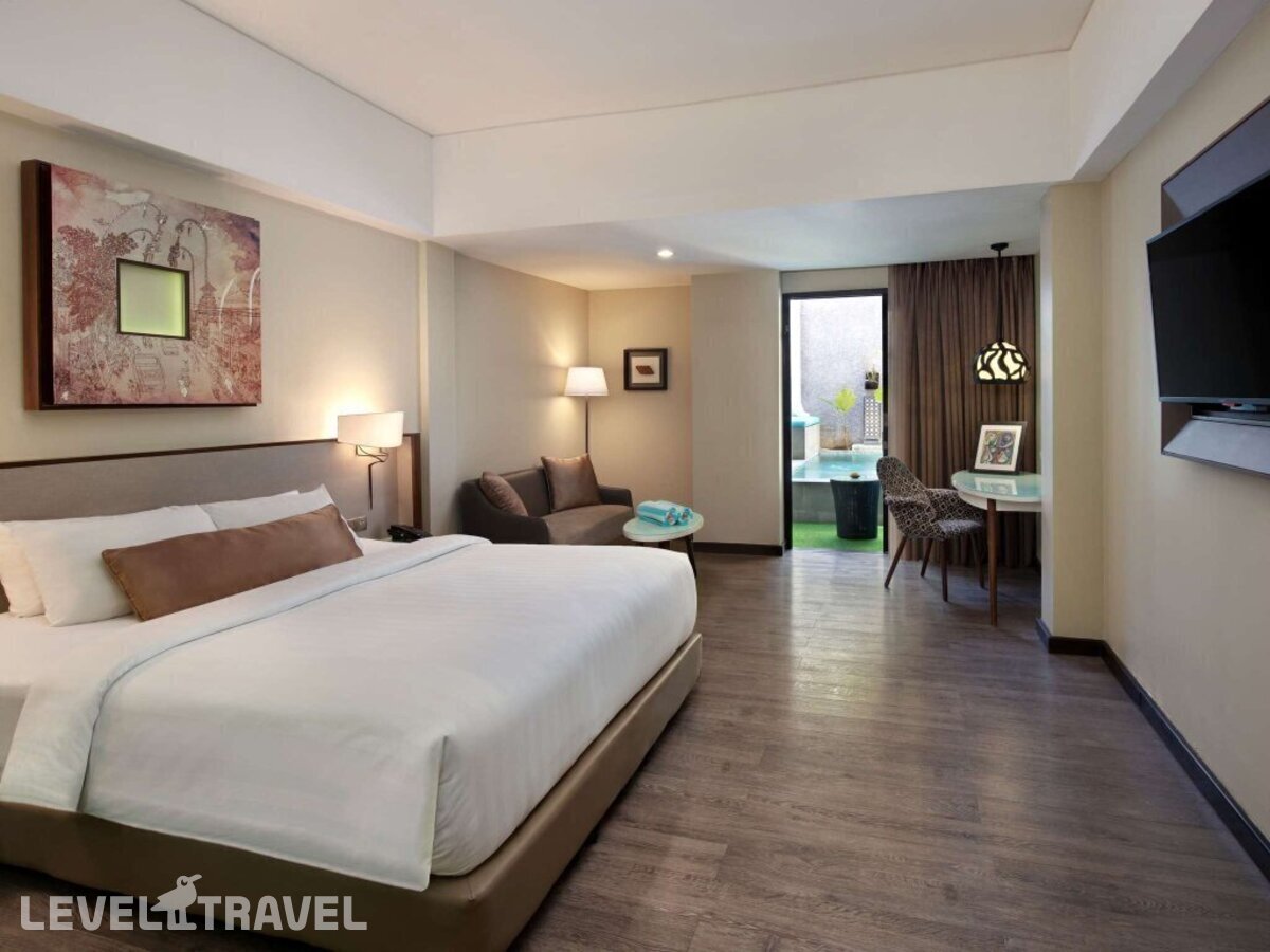 фотографии номера Делюкс с видом на бассейн отеля Mercure Bali Legian в Индонезия(Легиан) - фото №3