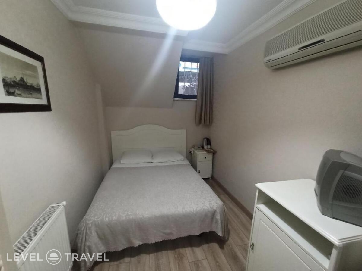 фотографии номера Экономичный номер отеля Asmali Hotel в Турция(Фатих) - фото №1