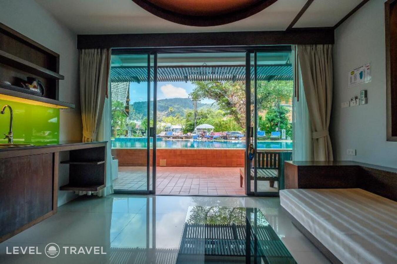 фотографии номера Гранд делюкс (две односпальные кровати) отеля Naina Resort & Spa в Таиланд(Патонг Бич) - фото №11
