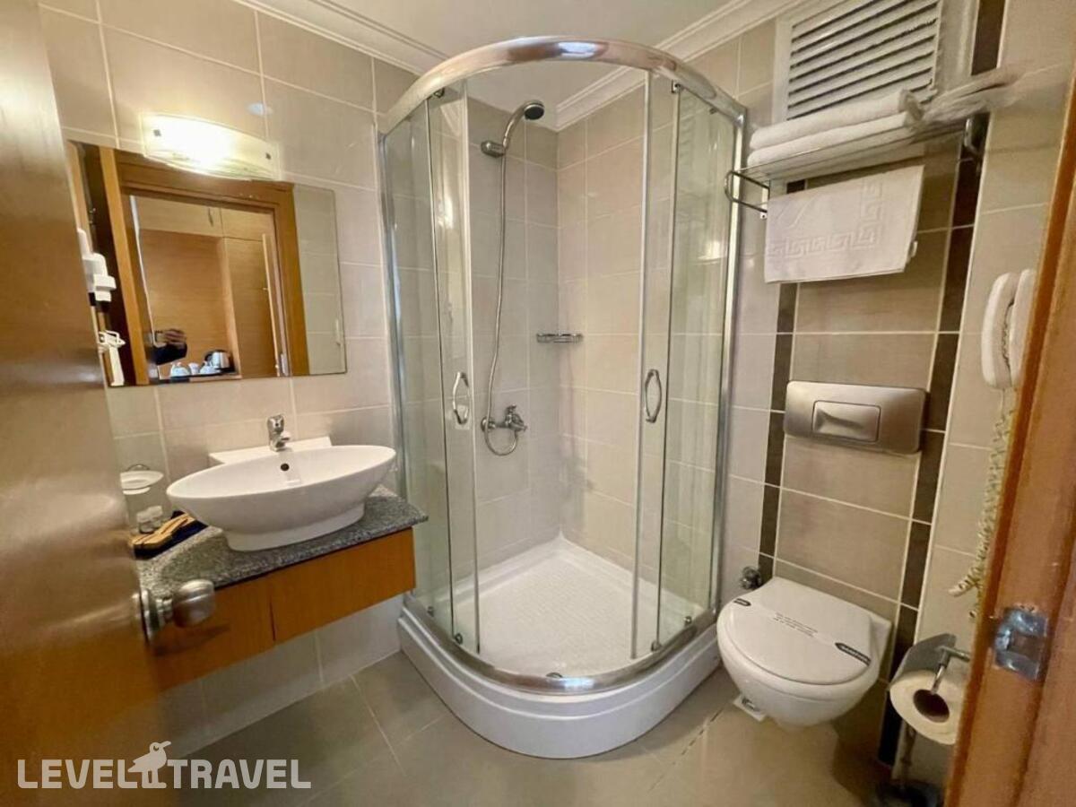 фотографии номера Двухместный номер Swim-Up двуспальная кровать отеля Green Forest Holiday Village в Турция(Олюдениз) - фото №4
