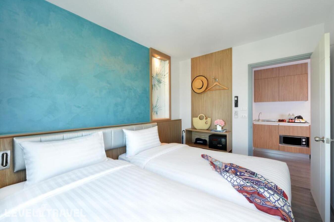 фотографии номера Двухместный номер Deluxe Premier 2 отдельные кровати отеля Centre Point Hotel Pattaya в Таиланд(Наклуа) - фото №1