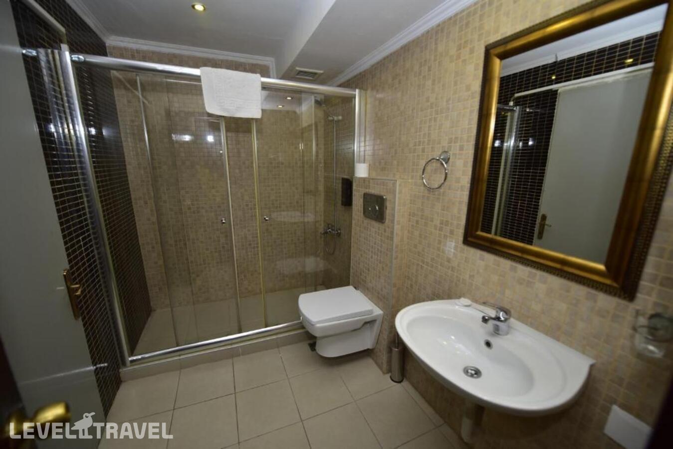 фотографии номера Трёхместный номер отеля Topkapi Hotel в Турция(Фатих) - фото №3