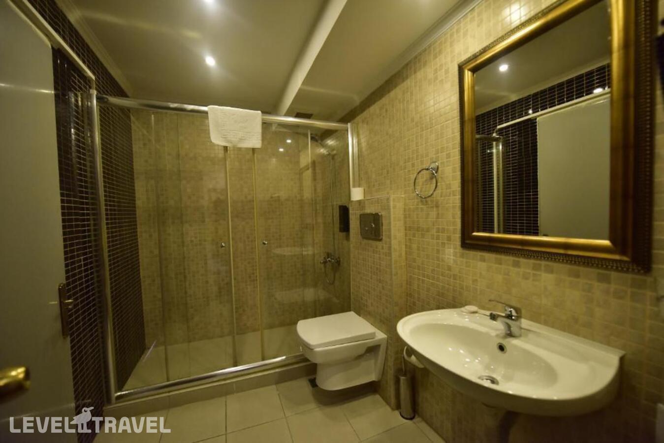 фотографии номера Трёхместный номер отеля Topkapi Hotel в Турция(Фатих) - фото №4
