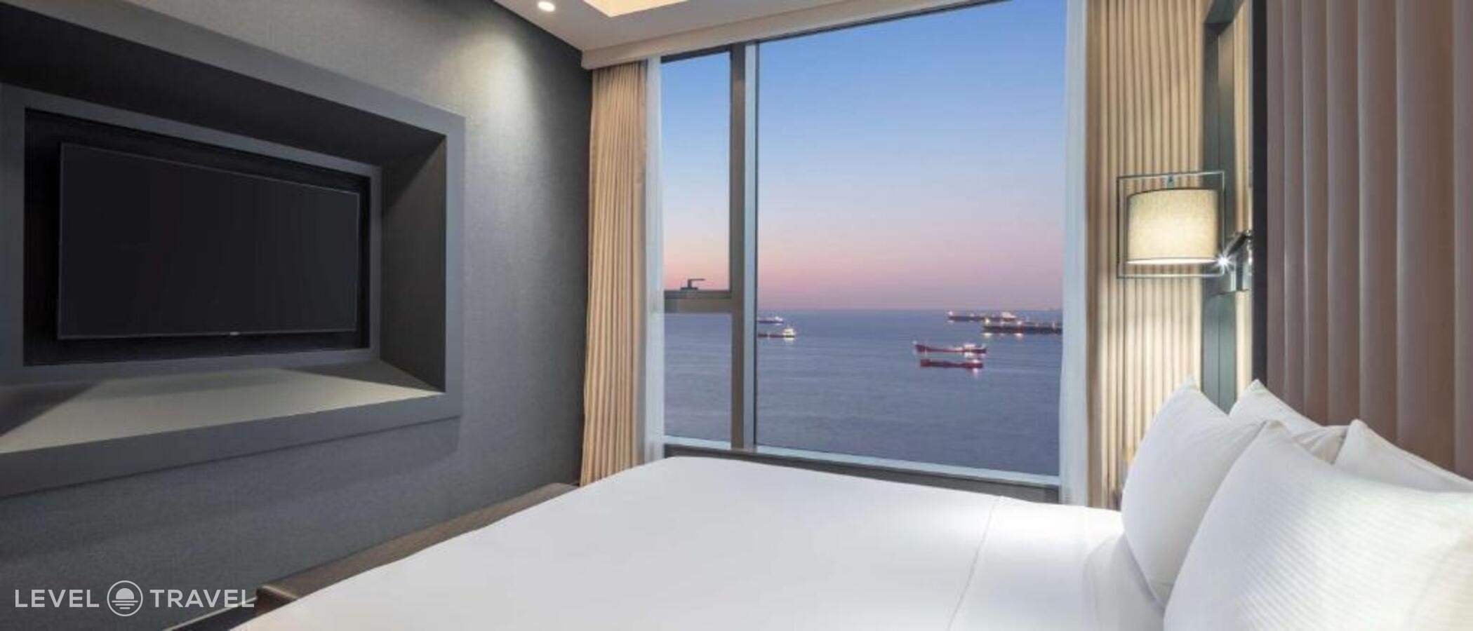 Двухместный люкс Grand Deluxe с видом на море двуспальная кровать — фото 2