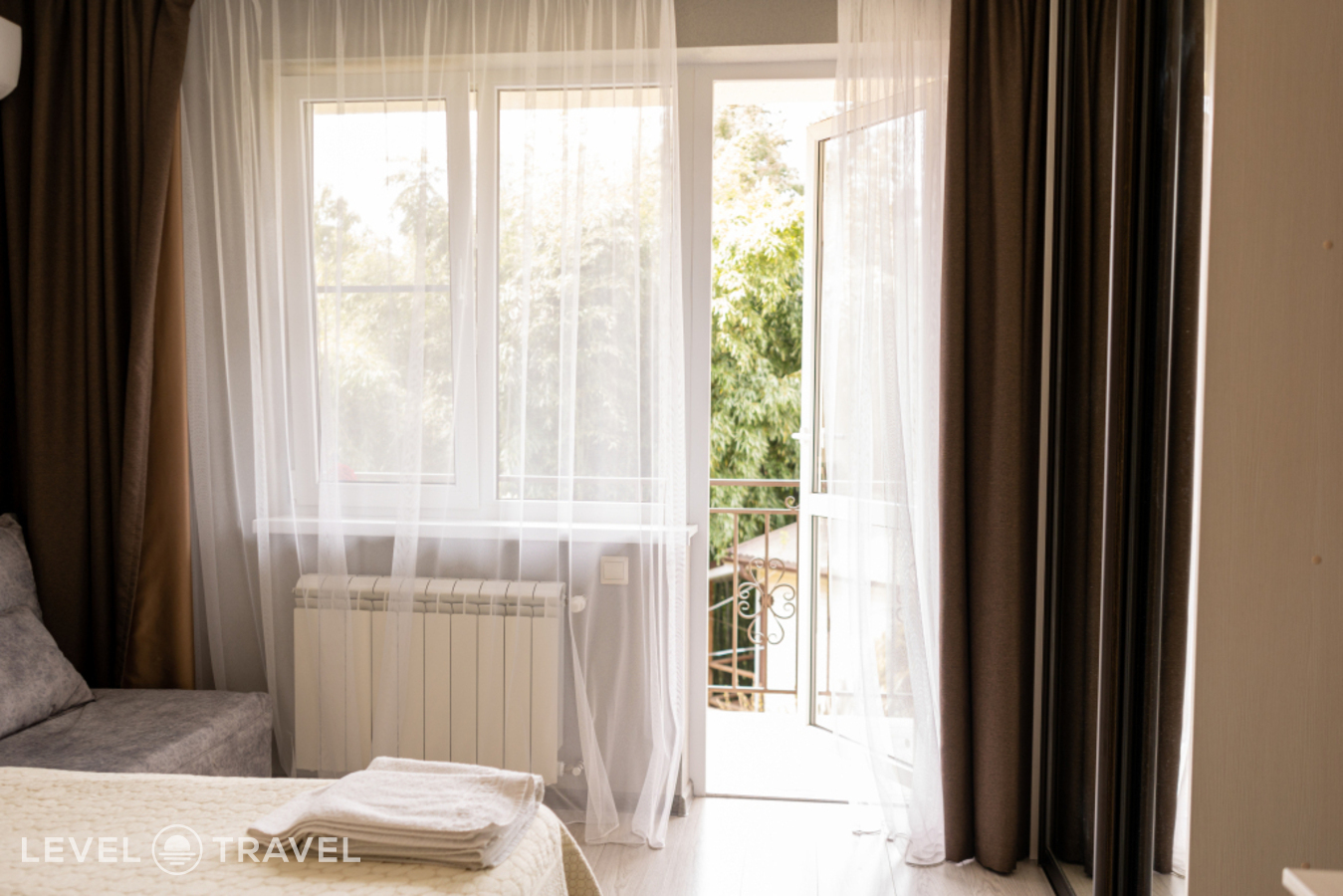 фотографии номера Трёхместный номер Superior с балконом и с красивым видом из окна отеля Гостевой Дом На Грибоедова 11 в Россия(Сочи) - фото №8