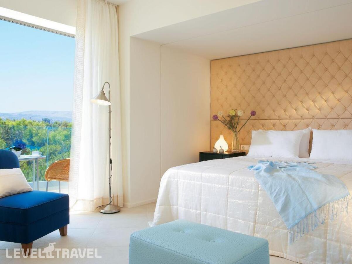 фотографии номера Улучшенный с видом на море отеля Grecotel Amirandes Exclusive Resort в Греция(Гувес) - фото №1