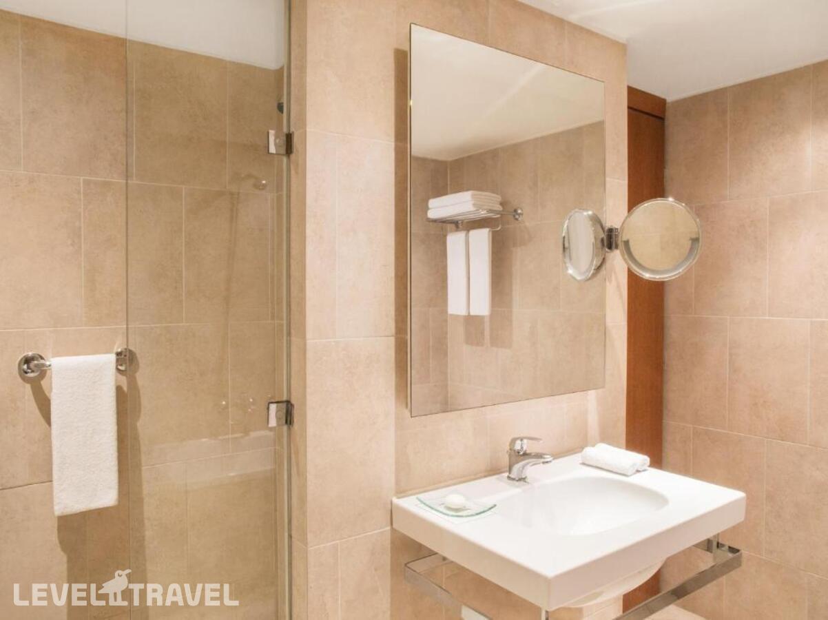 фотографии номера Улучшенный с видом на море отеля Grecotel Amirandes Exclusive Resort в Греция(Гувес) - фото №6