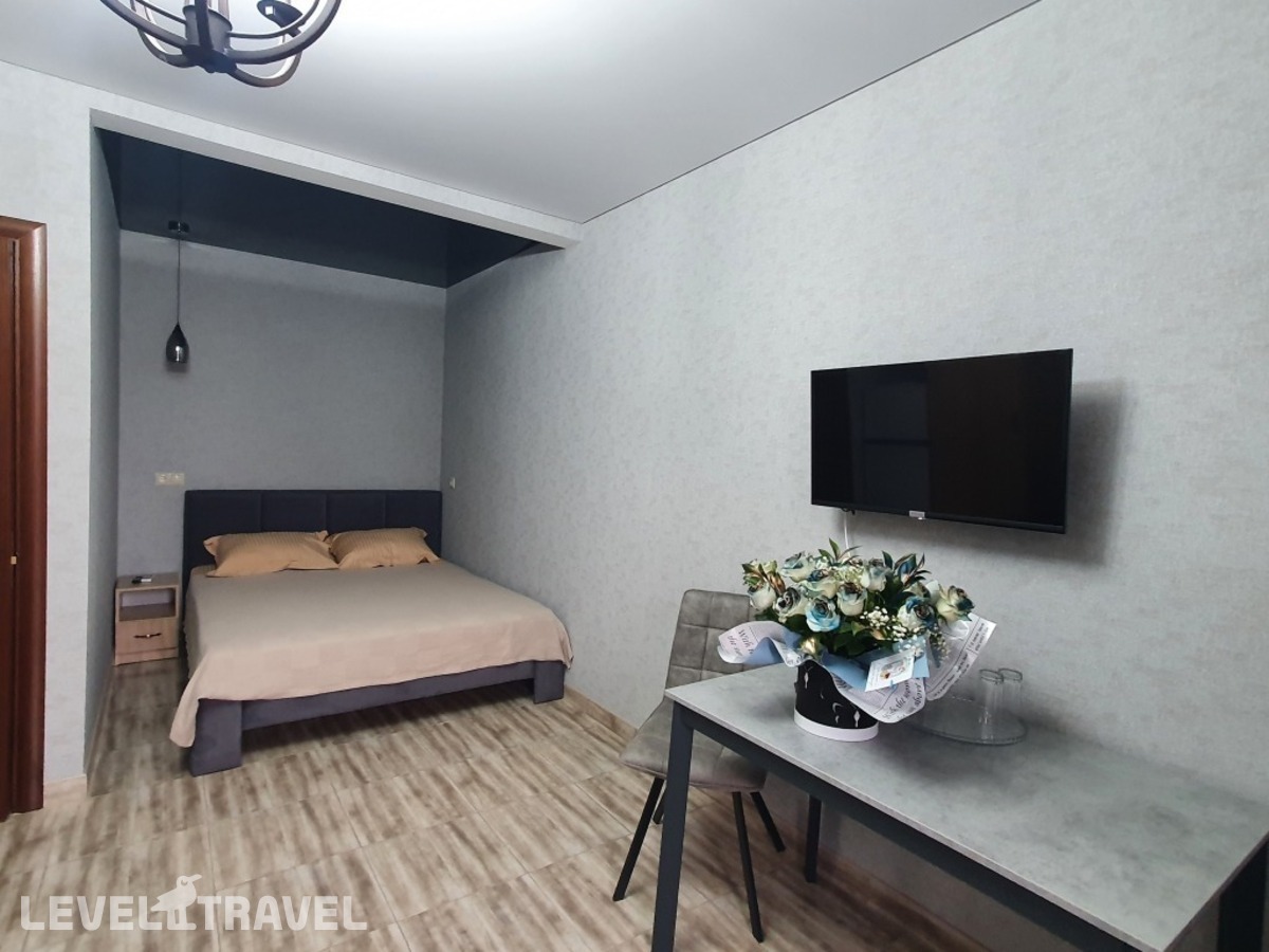 фотографии номера Четырёхместный номер Comfort с красивым видом из окна отеля Гостевой дом Аура в Россия(Избербаш) - фото №9