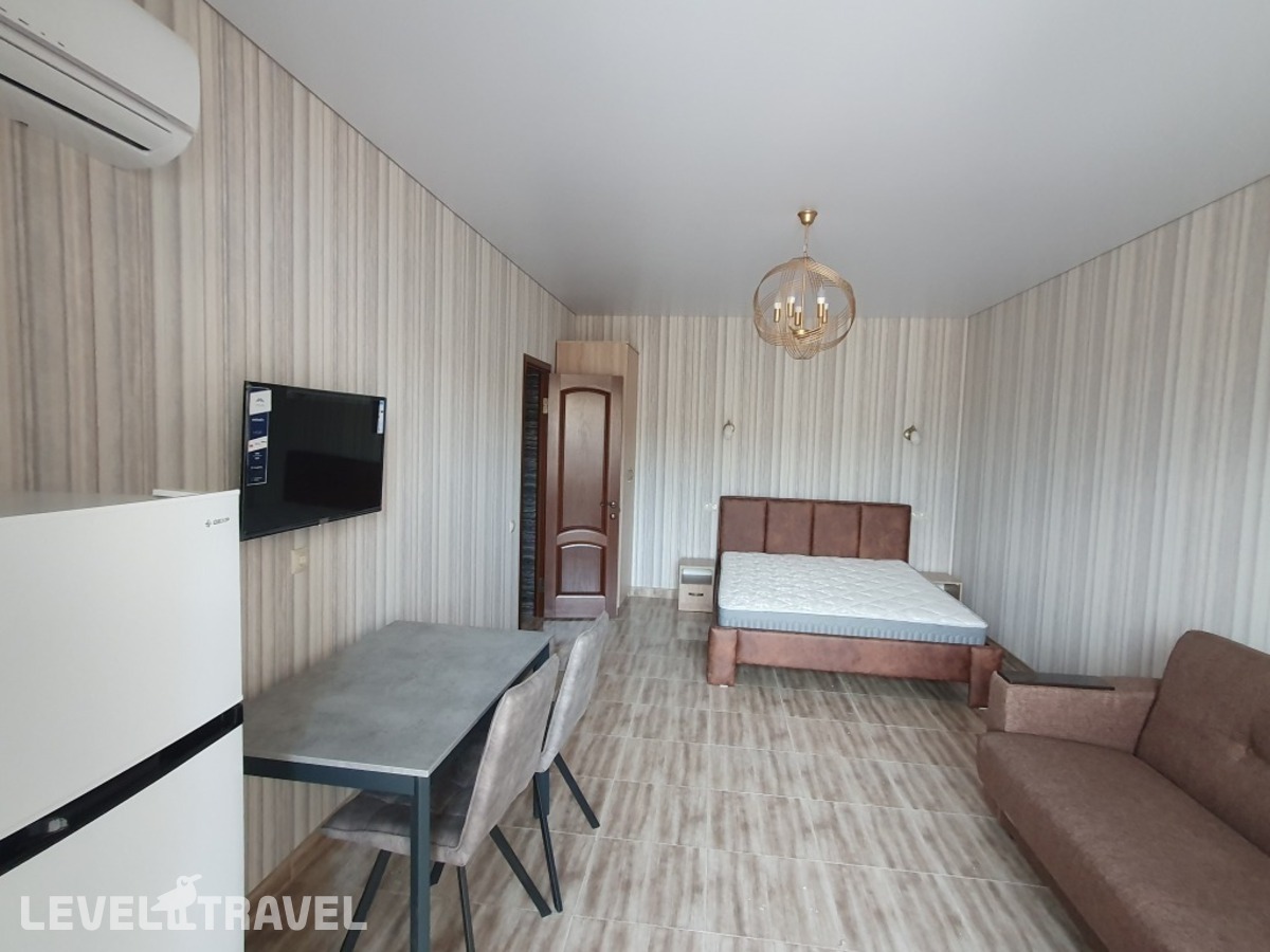 фотографии номера Четырёхместный номер Comfort с красивым видом из окна отеля Гостевой дом Аура в Россия(Избербаш) - фото №1