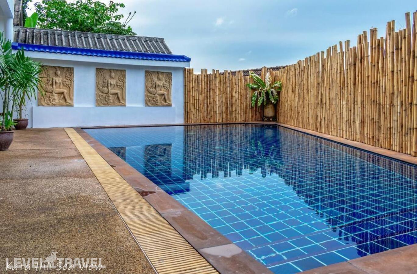 фотографии номера Двухместный номер Pool Access Superior двуспальная кровать отеля Kata Hill Sea View в Таиланд(Ката Бич) - фото №4
