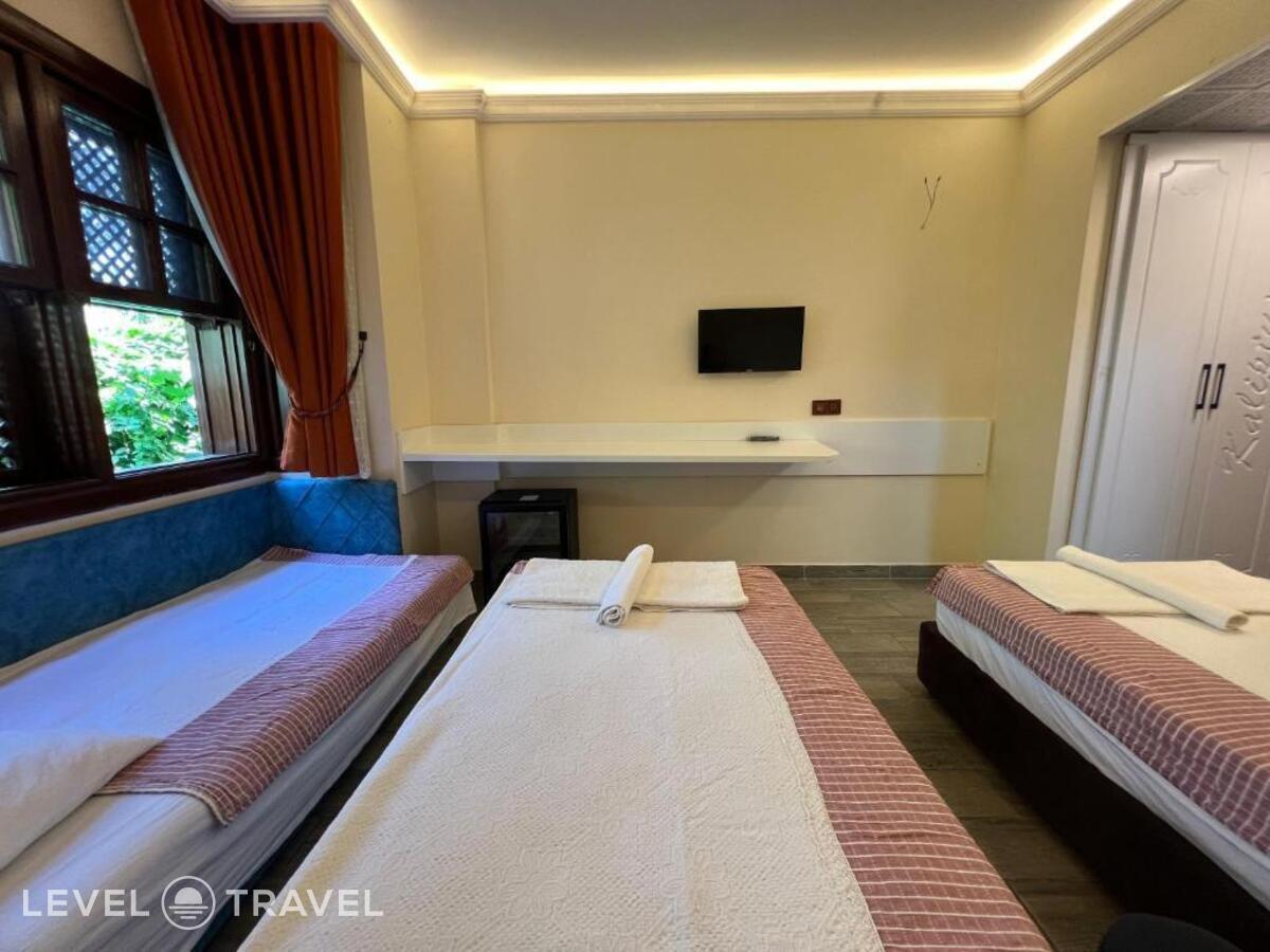 фотографии номера Трехместный номер отеля Kaliptus Hotel в Турция(Кемер - центр) - фото №1