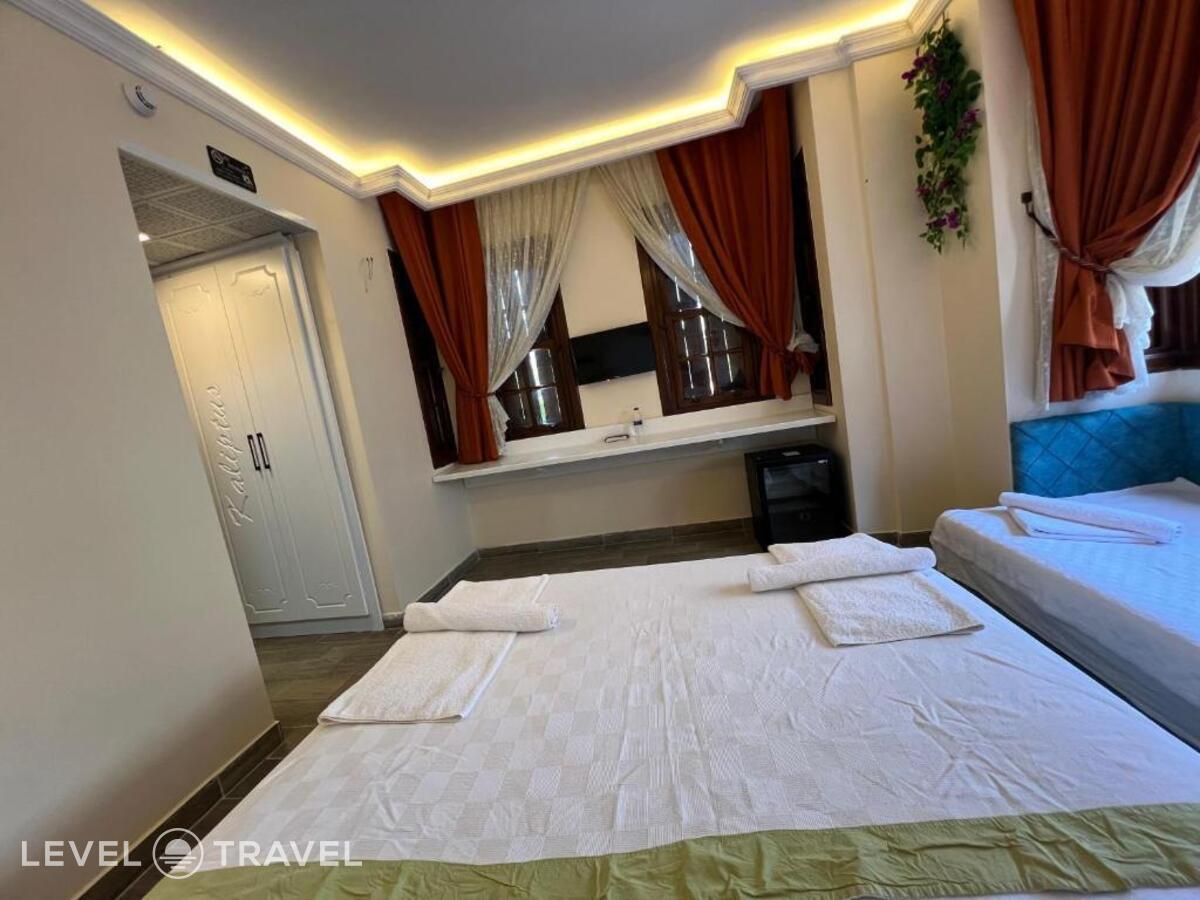 фотографии номера Трехместный номер отеля Kaliptus Hotel в Турция(Кемер - центр) - фото №2