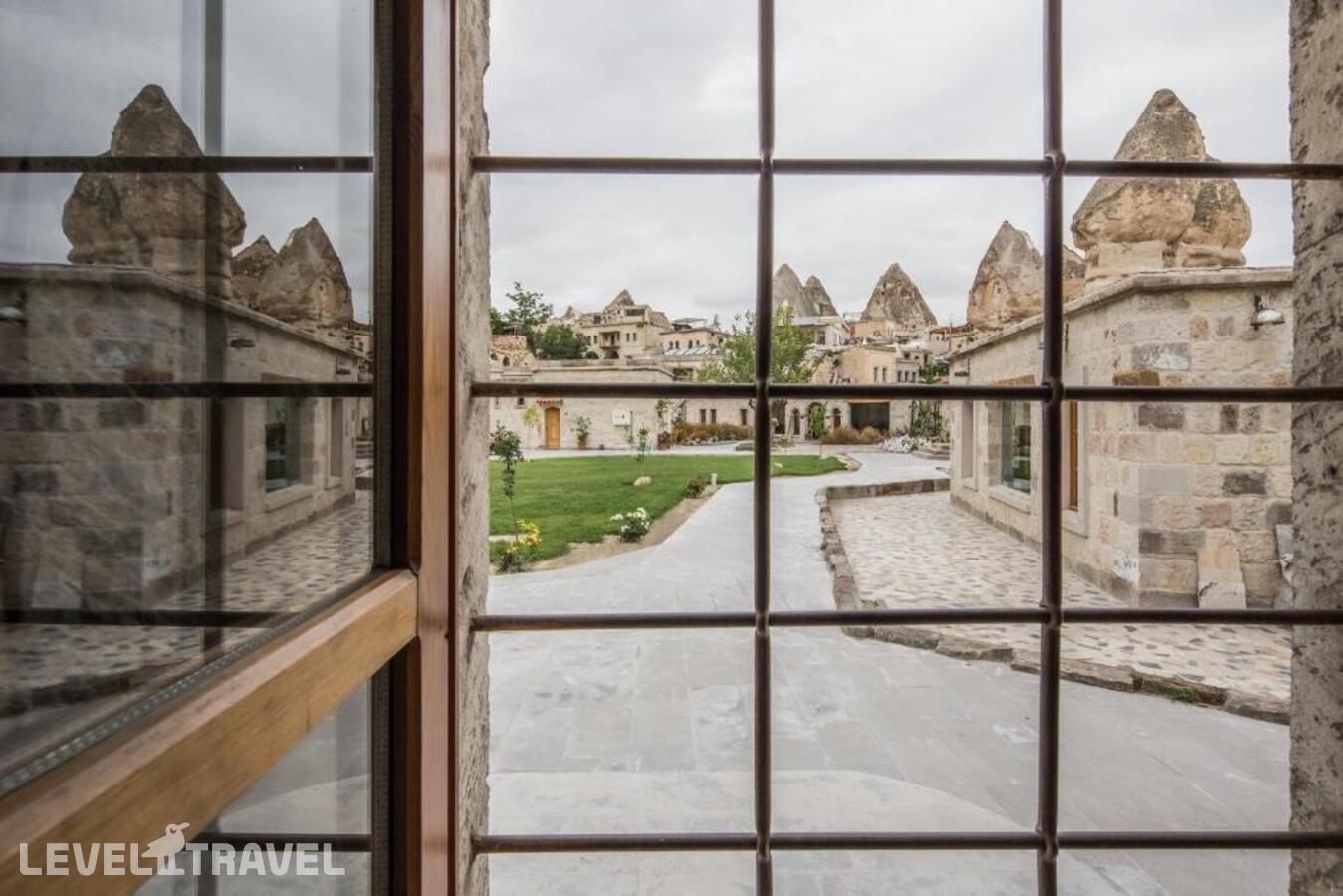 фотографии номера Трёхместный номер отеля Lunar Cappadocia Hotel в Турция(Гёреме) - фото №5