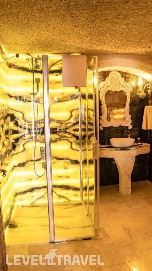 фотографии номера Двухместный номер Grand cave двуспальная кровать отеля Elika Cave Suites & Spa в Турция(Ортахисар) - фото №2