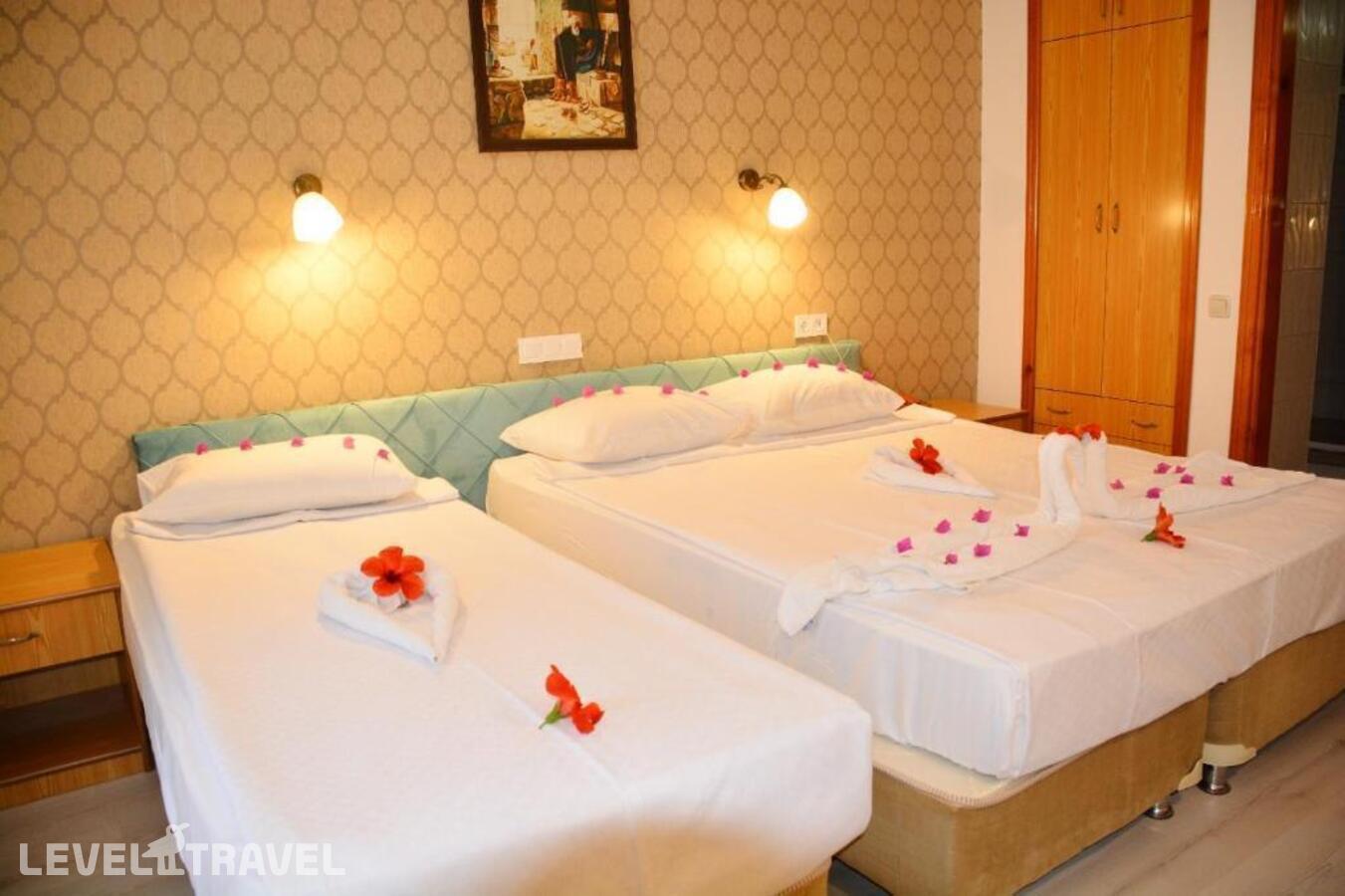 фотографии номера Трехместный номер отеля Miranda Moral Hotel в Турция(Кемер - центр) - фото №4