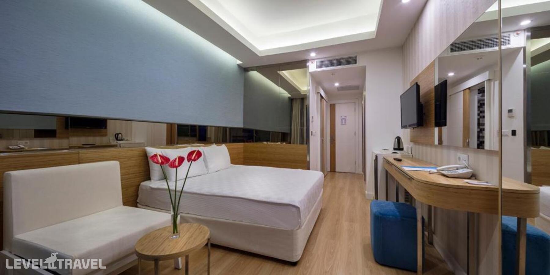 фотографии номера Стандартный номер отеля Dosinia Luxury Resort в Турция(Бельдиби) - фото №1